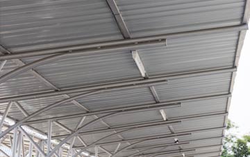 installing Holywell metal roofing